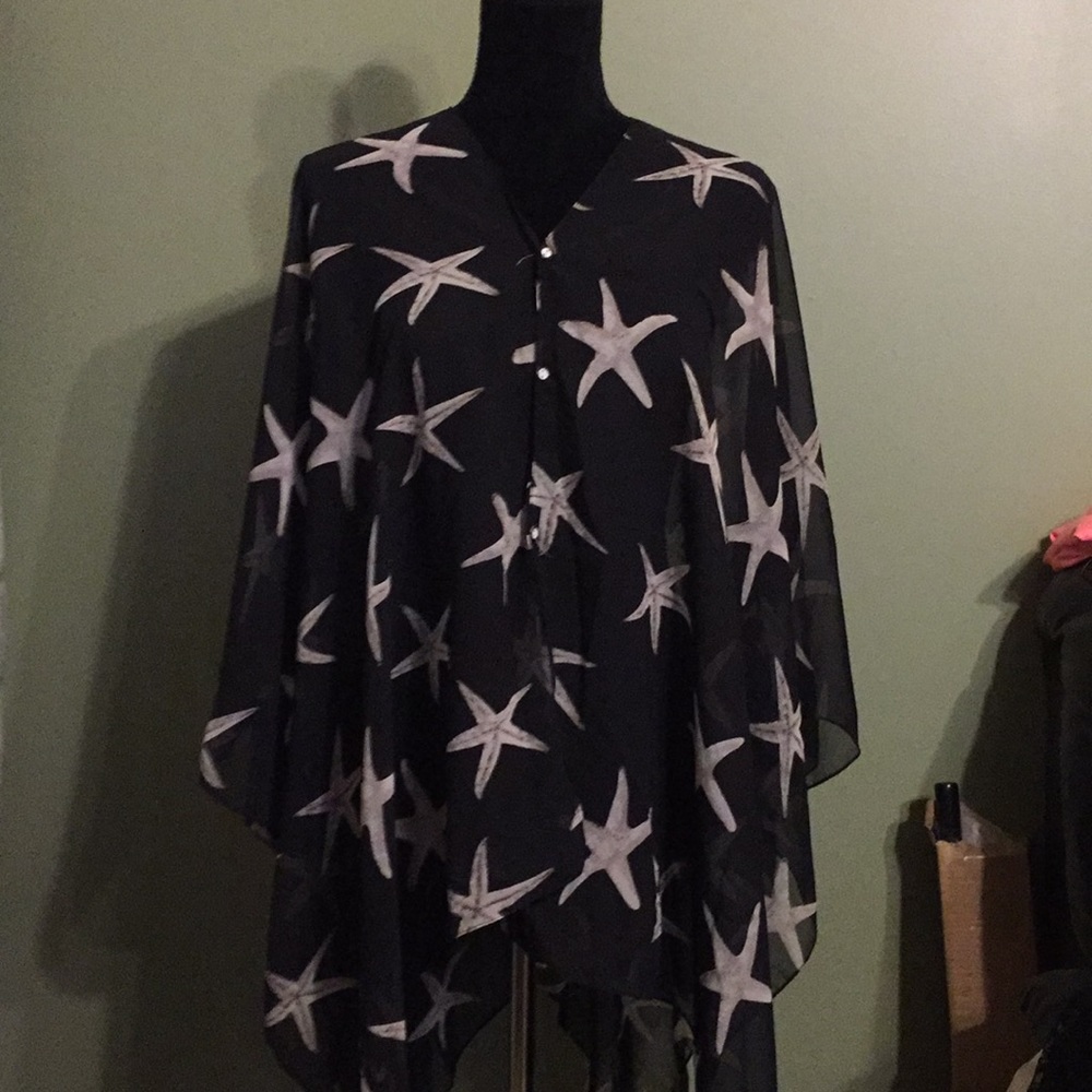 One size poncho style sheet top. OSFM